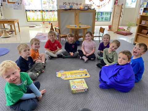 Children sitting in a circle.jpg